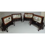 A Chinese porcelain set of 4 table screens, each decorated with genre scenes, carved frames with