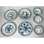 An 18th/19th century Chinese Nankin tea bowl in blue & white (chip to rim); 2 similar tea bowls