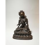 A Far Eastern gilt bronze figure of Buddha in the lotus position, height 19 cm, possibly Thai