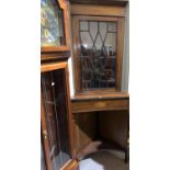 An Edwardian Sheraton style full height corner cupboard, inlaid mahogany, with astragal glazed