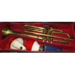A B & M Prefect brass trumpet with 3 mutes, cased