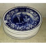 A collection of 11 Wedgwood commemorative plates, including WWII planes