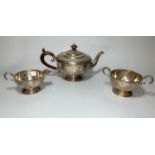 A hallmarked silver 3 piece tea set with beaded decoration, Birmingham 1930, 20 oz