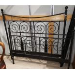 A Victorian style black metal 5' bed and 2 matching table lamps