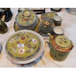 A mid 20th century Chinese "famille jaune" dinner service, including tureens, etc., circular