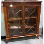 A yew wood reproduction display cabinet