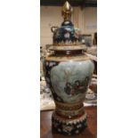 A large mid / late 20th century oriental covered vase on stand decorated in gilt and polychrome with