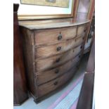 A Georgian style mahogany bow front chest of 4 long and 2 short drawers, ring handles