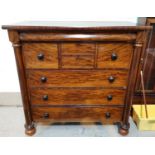 A 19th century "Scotch" chest with 3 long, 2 short and 2 deep drawers, turned side columns and feet,