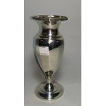 A hallmarked silver pedestal vase of ribbed baluster form, Birmingham 1921, 5.3 oz