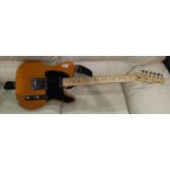 A Fender Squier Telecaster guitar, maple neck