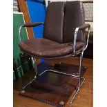 A mid century Italian designer armchair in chrome and leather by Castelli