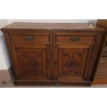 An Edwardian walnut side cabin et with 2 frieze drawers and 2 carved door cupboards