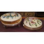 Two Victorian circular footstools in needlework upholstery