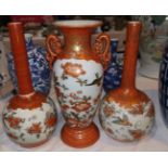 A Japanese garniture of 3 late Meiji vases, heights 9.5"