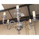 An ornate chromed 6-branch chandelier