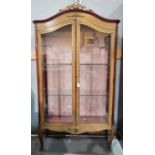 A Louis XV style vitrine by Epstein, in crossbanded kingwood with marquetry work extensive ormolu