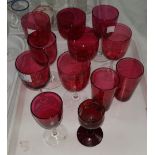 Thirteen various cranberry wine glasses