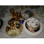 Eight English porcelain tea plates decorated with enamelled flowers, 17.5 cm; a Royal Winton cabinet