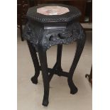An oriental octagonal vase stand, ebonised hardwood inset rosso marble top, height 62 cm