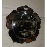 An Art Deco peach and clear glass wall mirror with convex centre, 17"