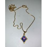 A floral enamel pendant stamped '750', on box chain stamped '750', 9.4 gm