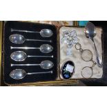 A set of 6 silver coffee spoons with seal tops; a silver preserve spoon; a trinket box; a pair of
