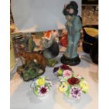 A Lladro figure of a young geisha girl; a selection of resin animals; cottages; etc.; 3 floral
