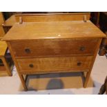 Two 1930's oak 2 height chests of drawers; a bamboo shelf unit
