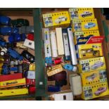 A collection of toy cars including some in boxes
