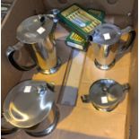 A stainless steel 4 piece tea/coffee set by Gense, Sweden; 2 boxed cutlery sets; a tea strainer