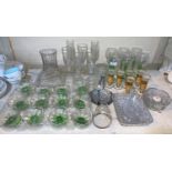 A set of 6 green stem hock glasses; 12 similar sundae dishes; other glassware; a Windsor part tea