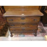 An oak 3 height dwarf chest of drawers in the Dutch manner