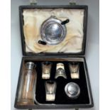 A silver/silver plated mounted travelling communion set, boxed, Sheffield 1958