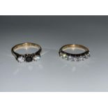 A 9 carat hallmarked gold 3 stone ring set sapphire and diamond simulant; a similar half eternity