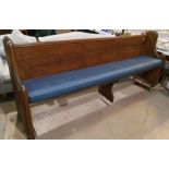 A gothic carved pitch pine bench, 240 cm