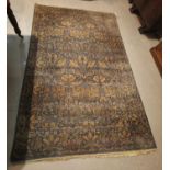 A hand woven carpet, 305 x 198cm approx