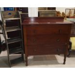 A mahogany 3 drawer chest; an oak narrow bookcase