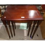 A nest of 3 mahogany occasional tables