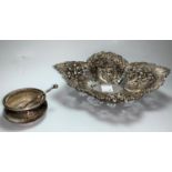 A hallmarked silver pierced dish on oval foot, Sheffield 1907, 4.3 oz; a hallmarked silver salt