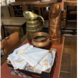 A large brass bound wooden jug; a copper vase; a copper coal scuttle; a selection of table linen