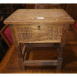 A Jacobean style oak workbox/stool; 2 pine stools; an occasional table