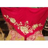 An embroidered red crepe shawl, 122 cm square