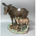 A late 1970's / early 80's Lladro group of elk with 2 young by Salvador Furio (1 ear restored)