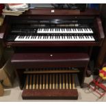 An AT 90 twin manual electric organ by Roland Atelier, with stool