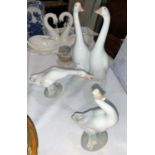A Lladro porcelain figure group of 2 geese "Pareja de Ocas"; 2 other figures