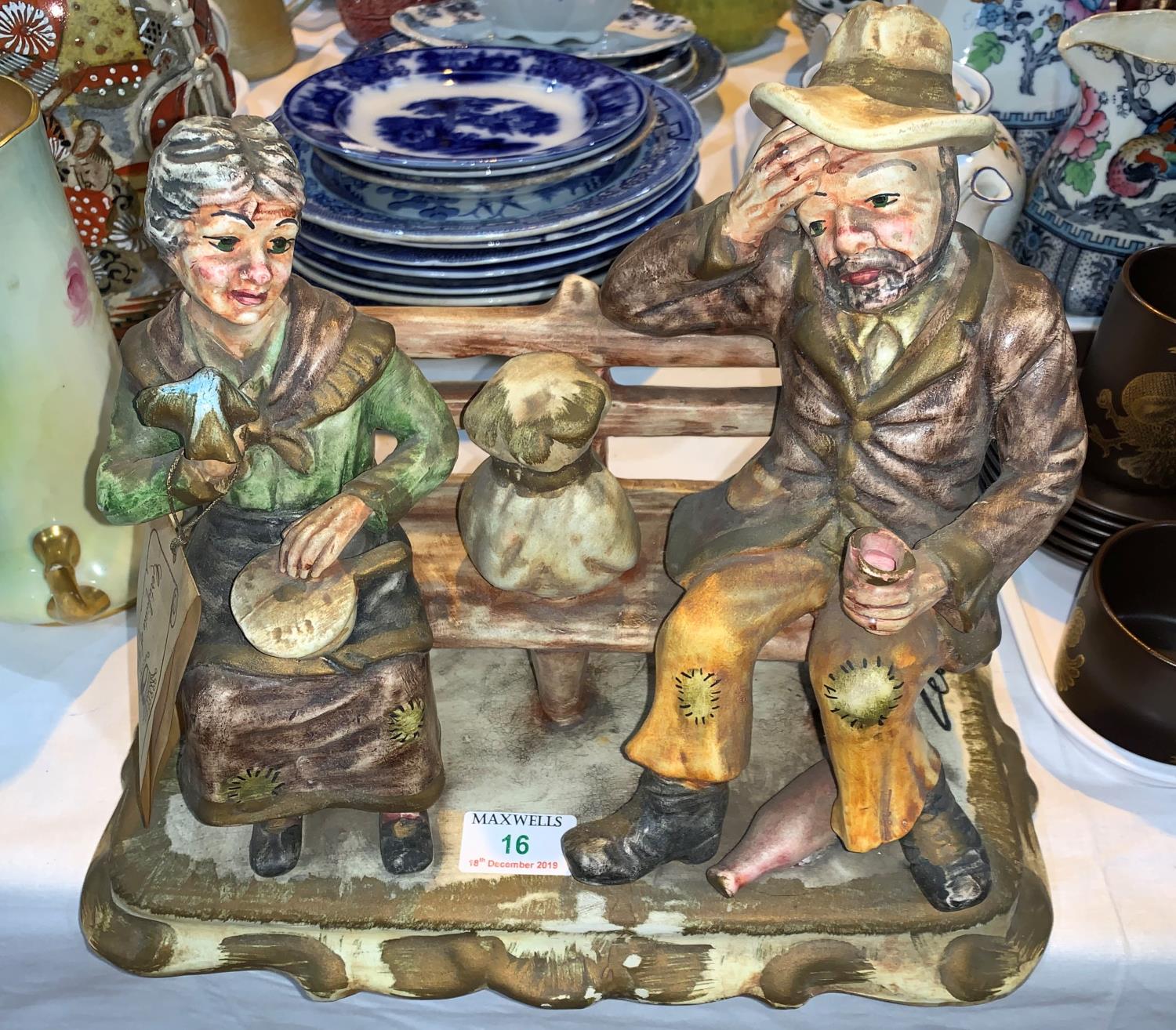 Two Royal Doulton ladies: Ninette, HN 2379 & Buttercup, HN 2309; a large Capodimonte group: man