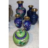 A good quality Chinese cloisonné ginger jar in green with floral decoration; a similar blue vase;