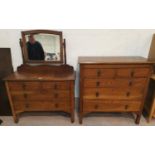 An Edwardian oak 2 piece bedroom suite comprising dressing table and chest of 3 long and 2 short