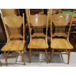A set of 4 Shaker style dining chairs with spindle backs